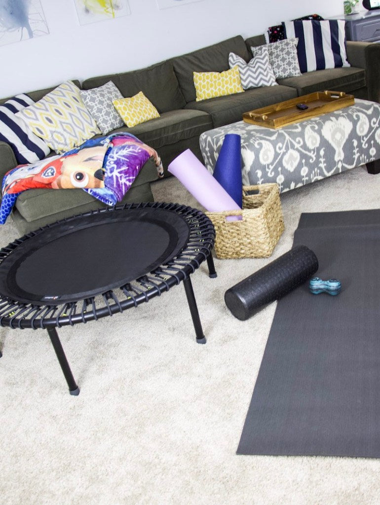 I have countless clients ask me what are easy ways they can store their exercise equipment in their basements that also acts as a play area for their kids