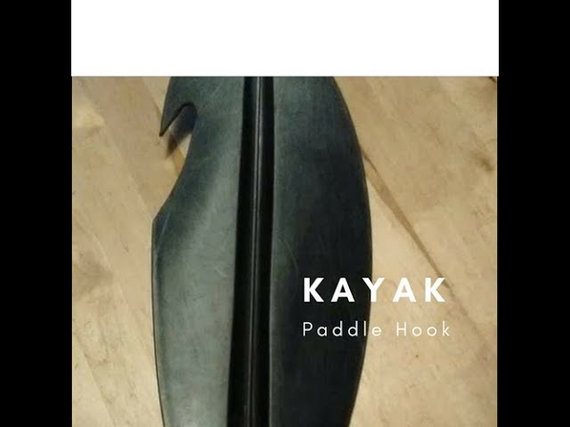 Showing off pros and cons of cutting a utility hook into my kayak paddle.